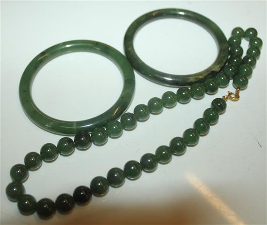 2 jadeite bangles and a necklace